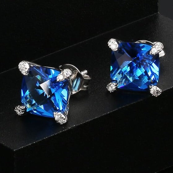 Infinity Blue Topaz Platinum plated Silver Stud Earrings:Jian London:Silver  Earrings